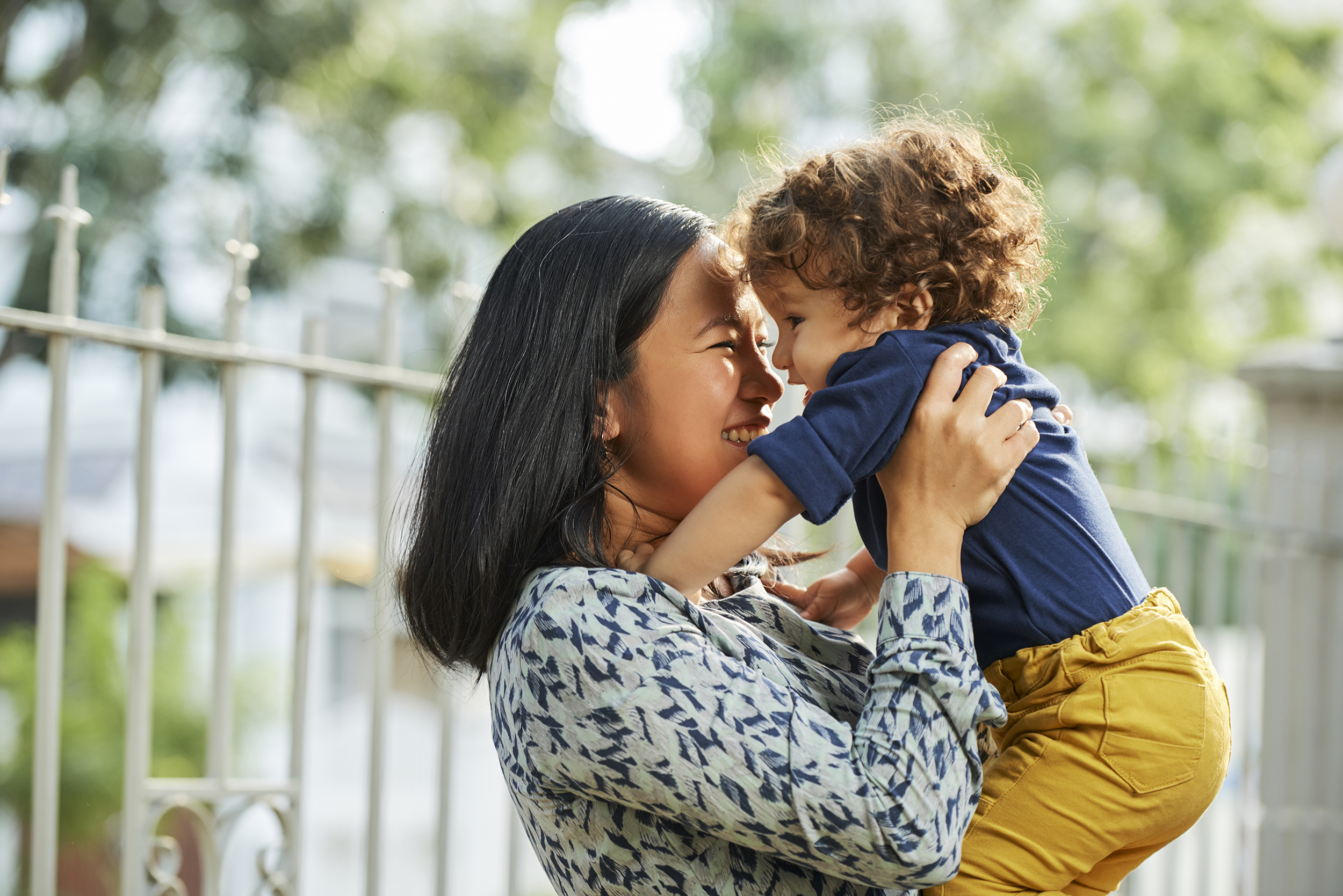 A woman holding a toddler